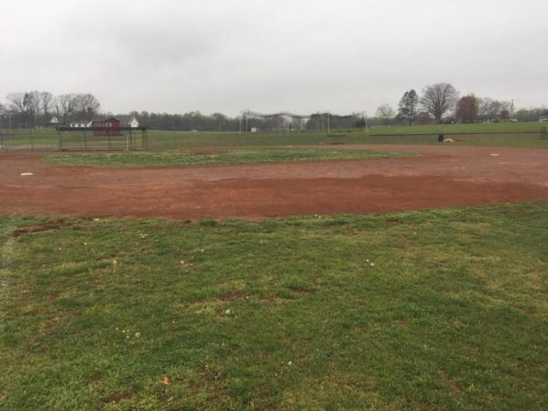 repaired school baseball field after regrading and proper drainage installation by Parks' Waterproofing