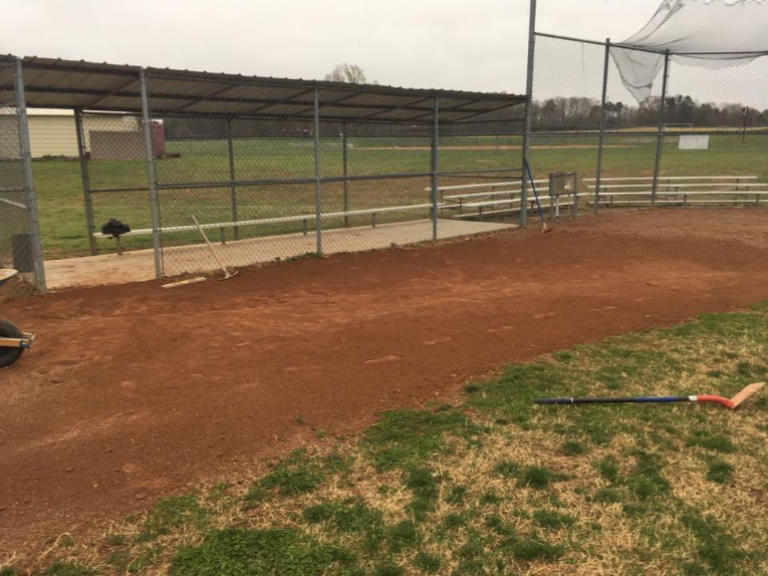 repaired school baseball field after regrading and proper drainage installation by Parks' Waterproofing